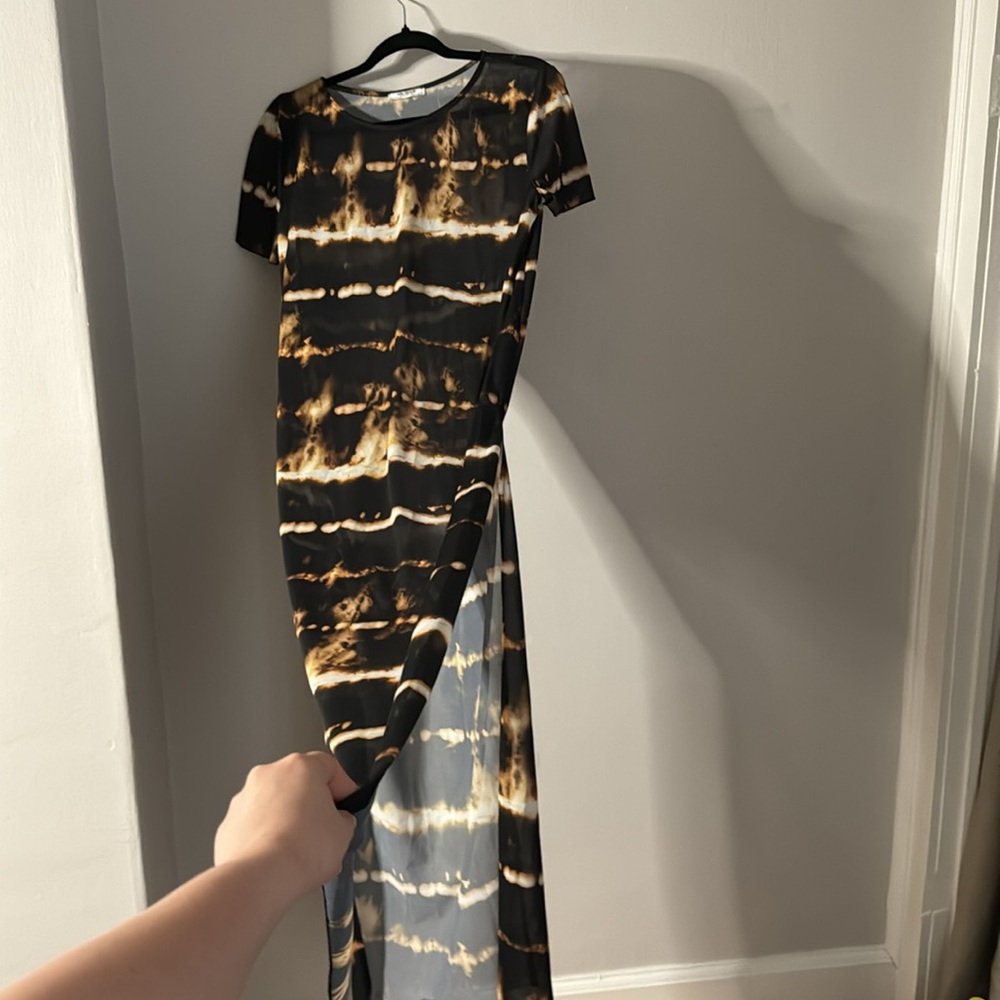 Zara long dress fends black flames see throughout